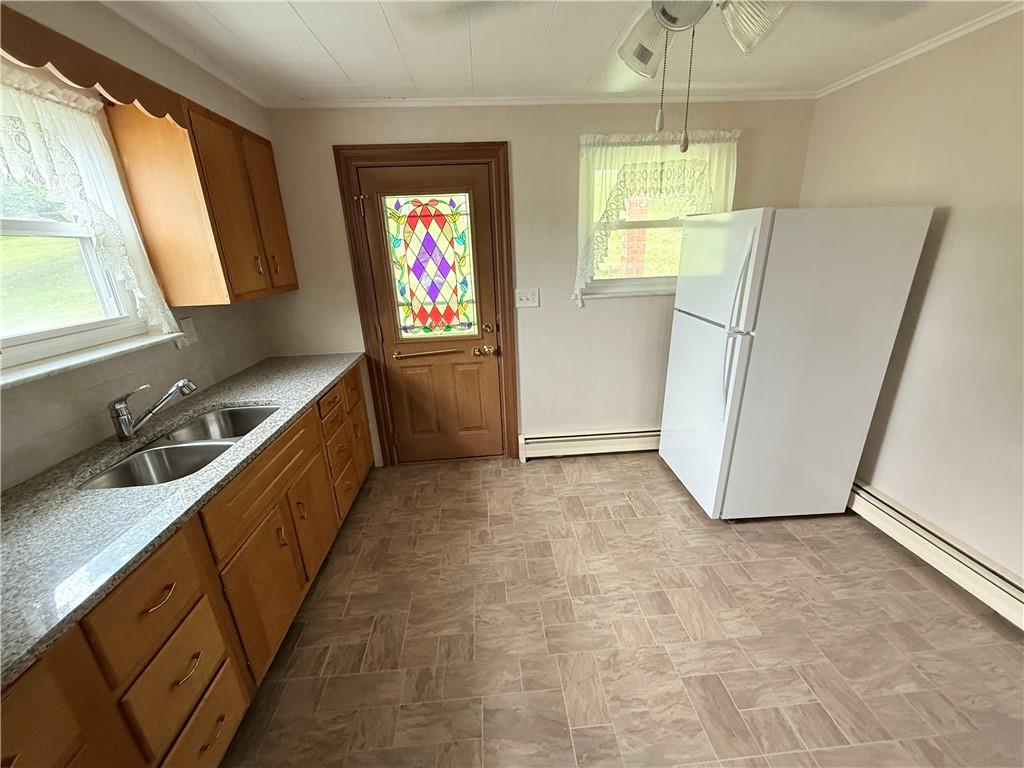 1111 Schang Road Pittsburgh, PA 15236 - Photo 3 of 12 a kitchen with refrigerator a window and a sink
