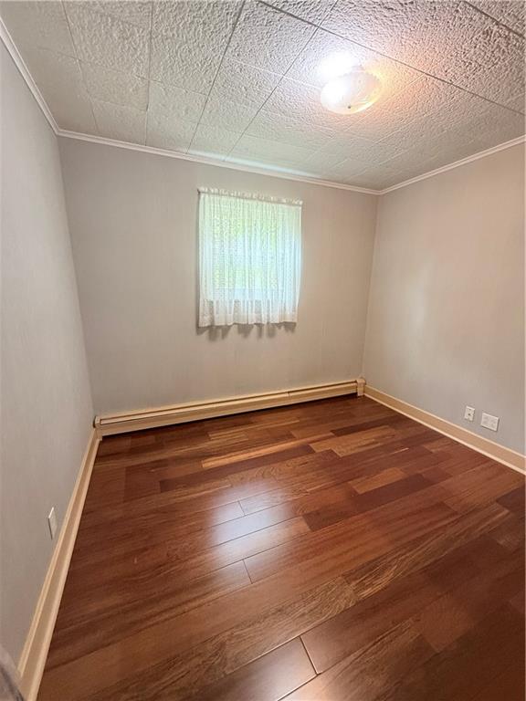 1111 Schang Road Pittsburgh, PA 15236 - Photo 7 of 12 wooden floor in an empty room with a window