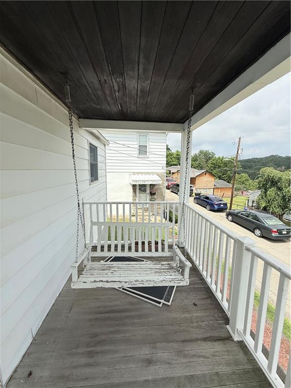 1111 Schang Road Pittsburgh, PA 15236 - Photo 10 of 12 a view of porch with wooden floor and roof