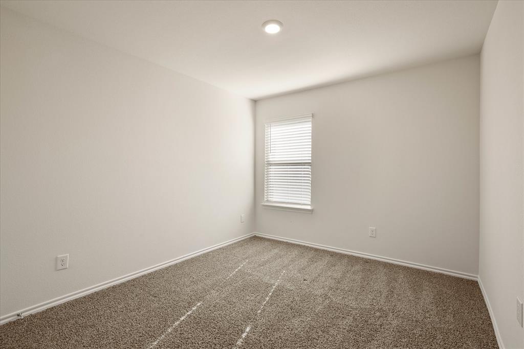 3117 Pr Hl Grove Crandall, TX 75114 - Photo 11 of 16 an empty room with a window