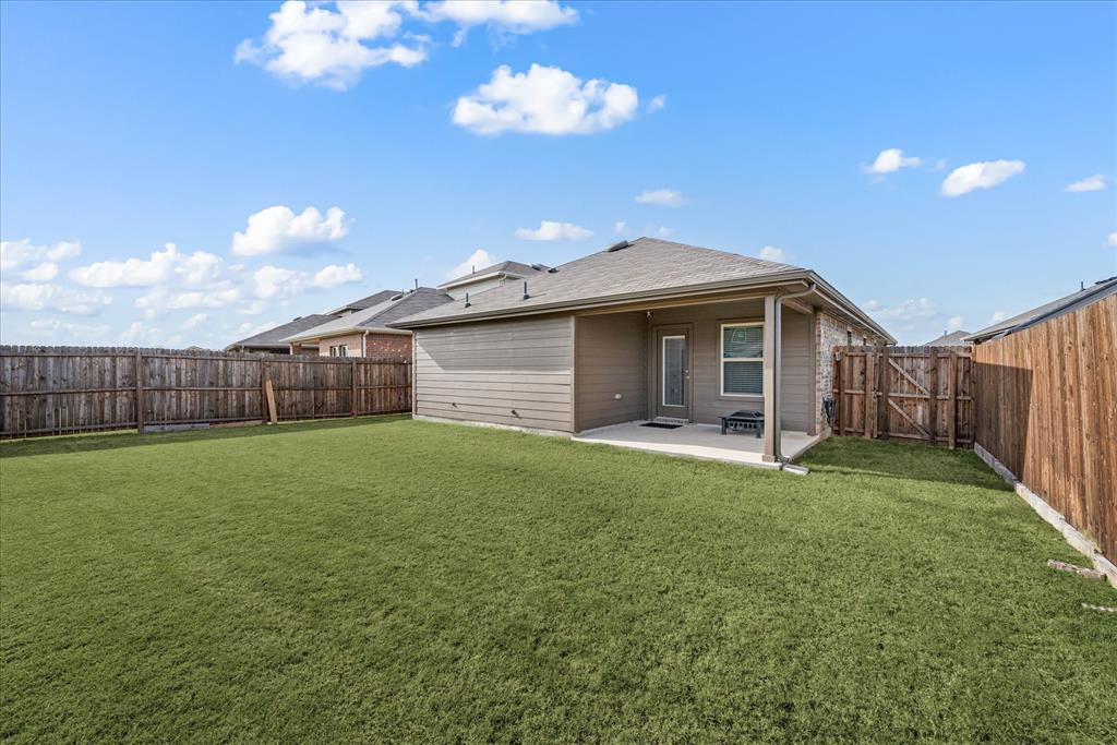 3117 Pr Hl Grove Crandall, TX 75114 - Photo 15 of 16 a view of a house with a backyard