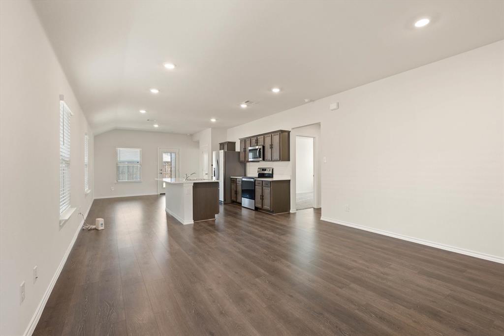 3117 Pr Hl Grove Crandall, TX 75114 - Photo 3 of 16 a view of empty room with wooden floor