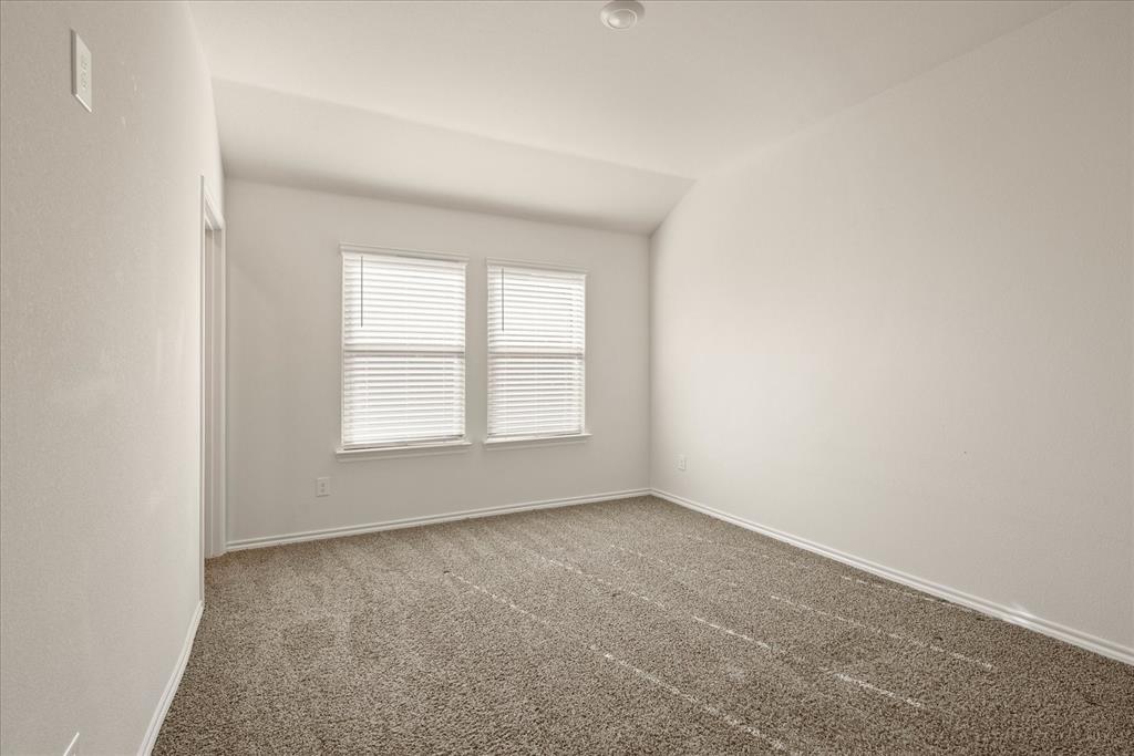 3117 Pr Hl Grove Crandall, TX 75114 - Photo 8 of 16 an empty room with a window