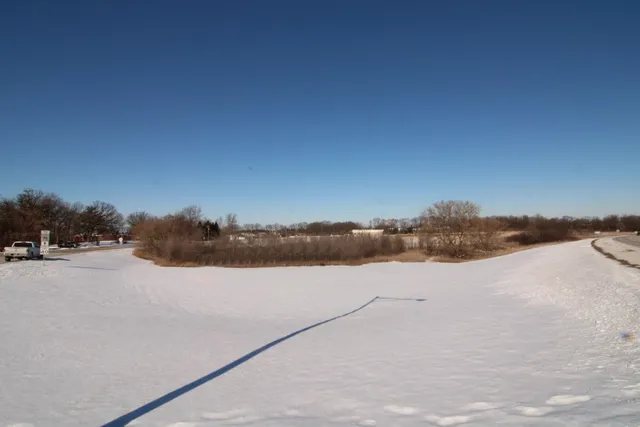 a view of outside space and a mountain view