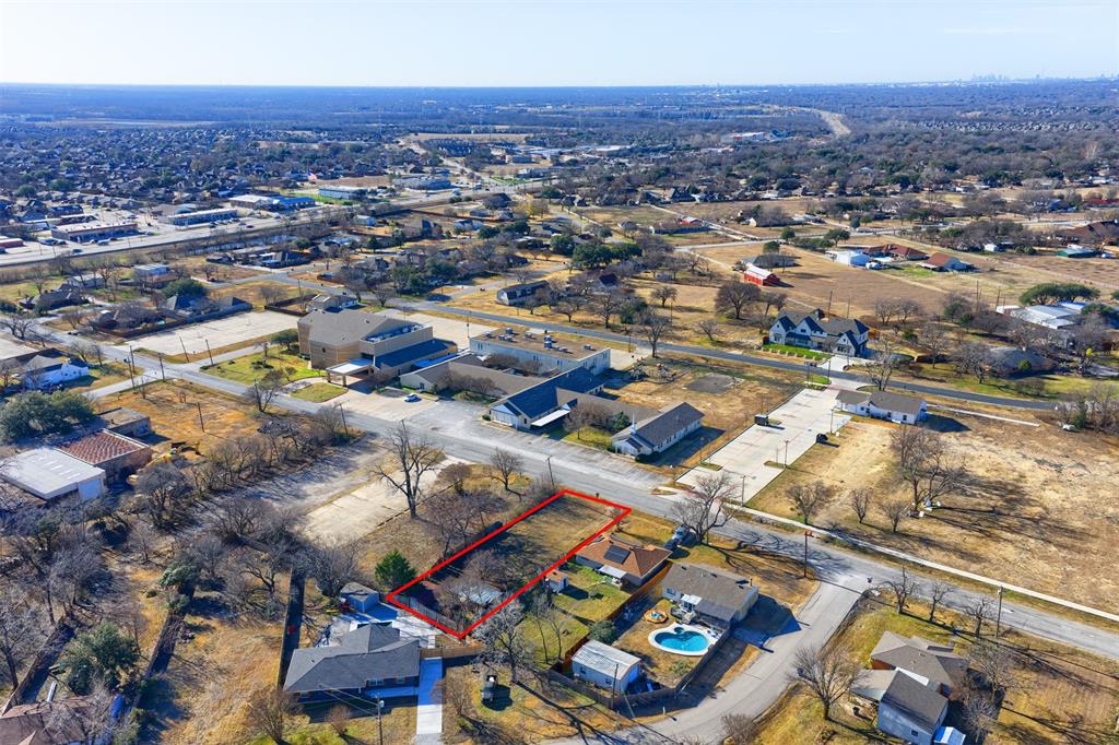 2407 3rd Street Sachse, TX 75048 - Photo 5 of 10 an aerial view of residential houses with outdoor space