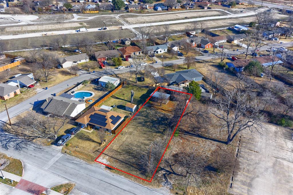 2407 3rd Street Sachse, TX 75048 - Photo 7 of 10 a picture of a book and a couch