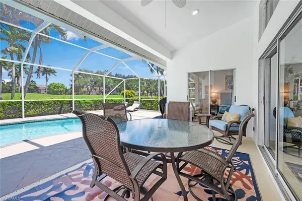 a view of a swimming pool with a porch