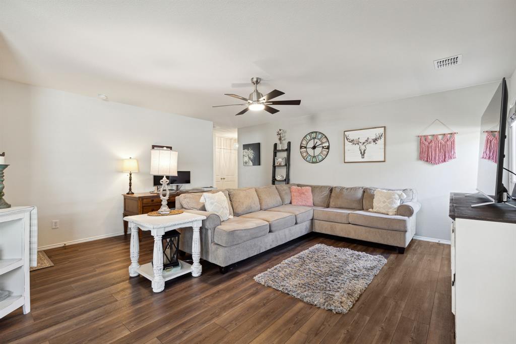5513 Berea Street Forney, TX 75126 - Photo 3 of 29 Living room with a ceiling fan