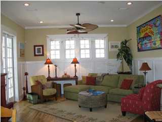 106 Chelsea Loop Road Santa Rosa Beach, FL 32459 - Photo 3 of 14 a living room with furniture and a large window