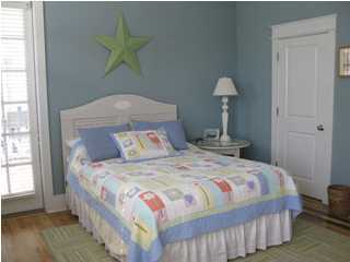106 Chelsea Loop Road Santa Rosa Beach, FL 32459 - Photo 4 of 14 a bedroom with a bed and a window