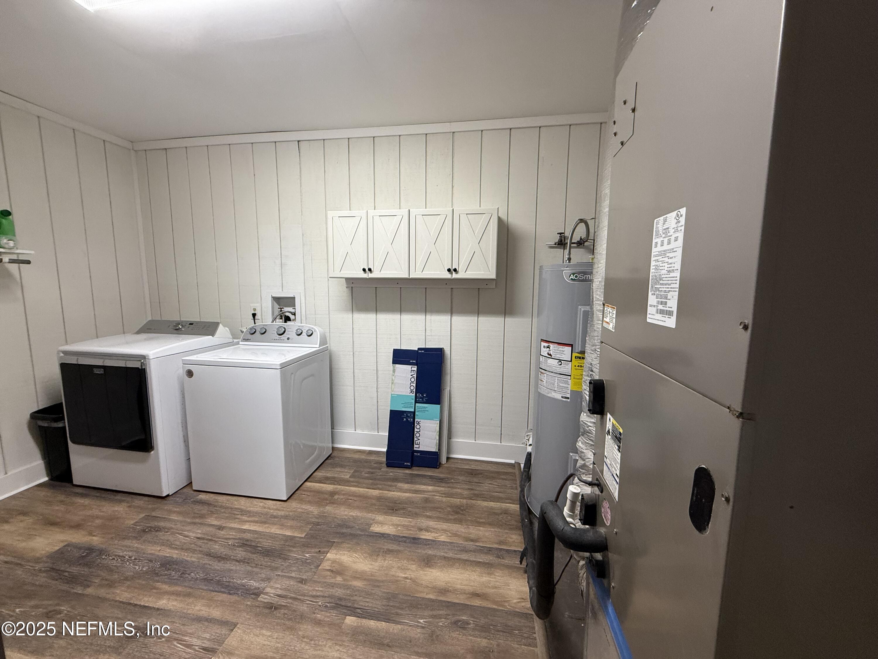 6049 Taylor Road Jacksonville, FL 32234 - Photo 42 of 60 a utility room with dryer and washer