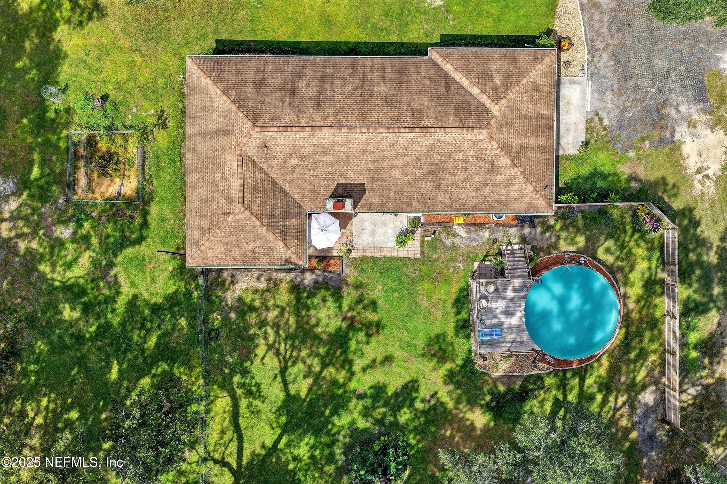 6049 Taylor Road Jacksonville, FL 32234 - Photo 47 of 60 an aerial view of a house with outdoor space and sitting area