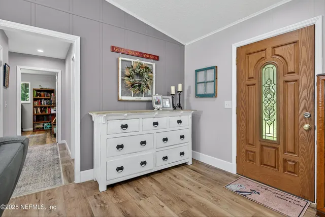 a view of an house with backyard space and garden