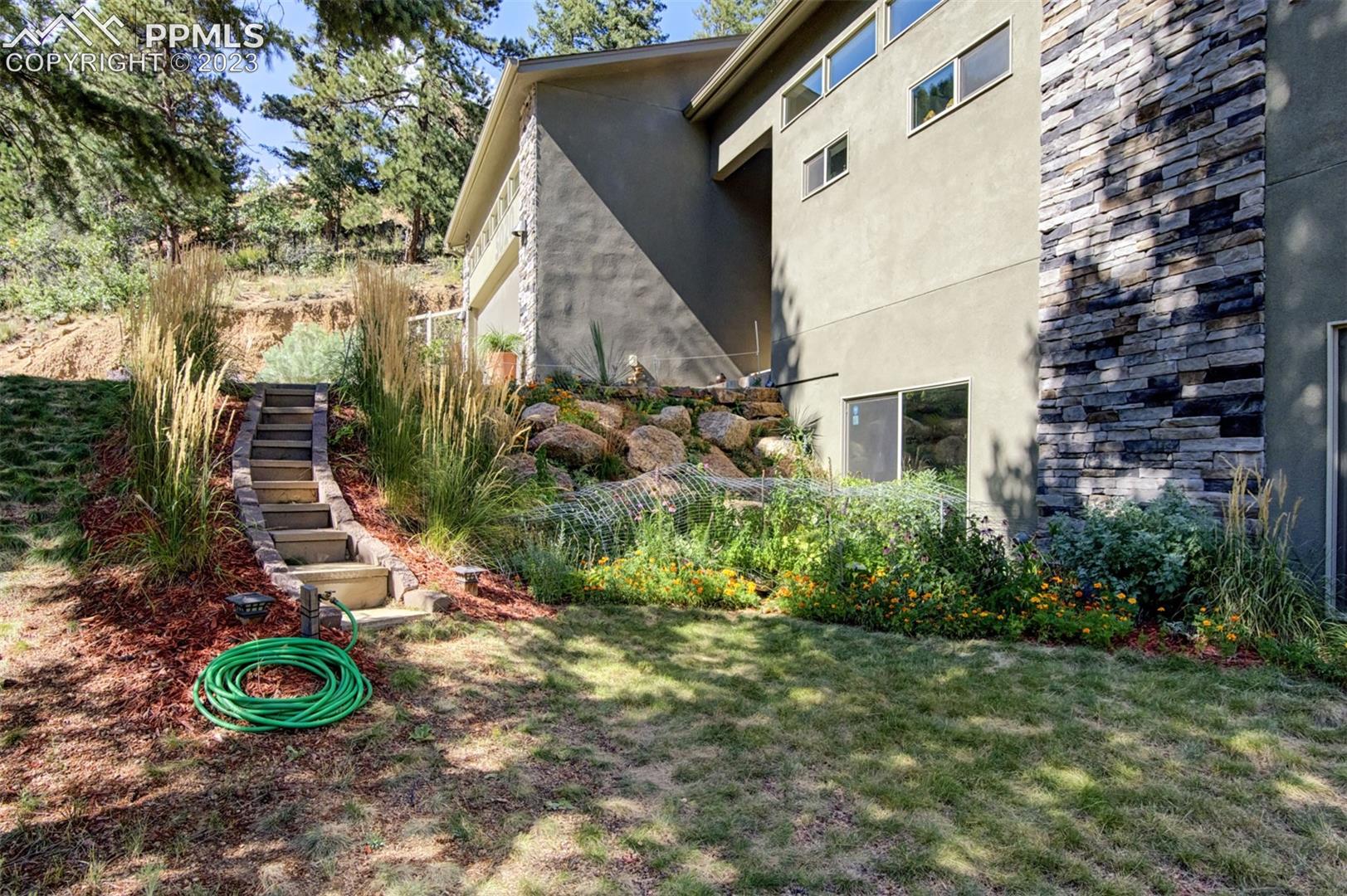 5020 South High Ridge View Manitou Springs, CO 80829 - Photo 44 of 46 Front yard which brings you down to the lower level patio!