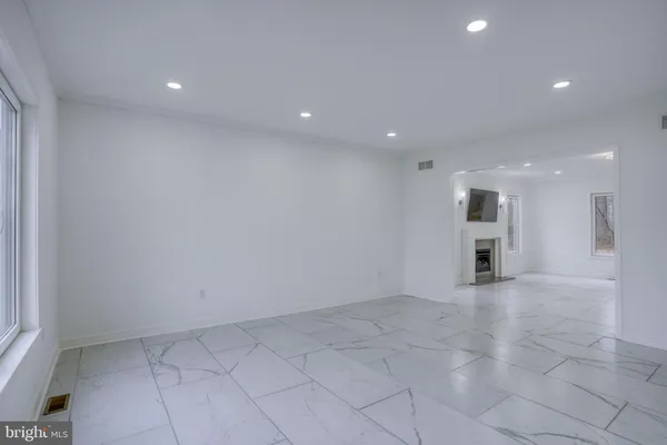 an empty room with windows