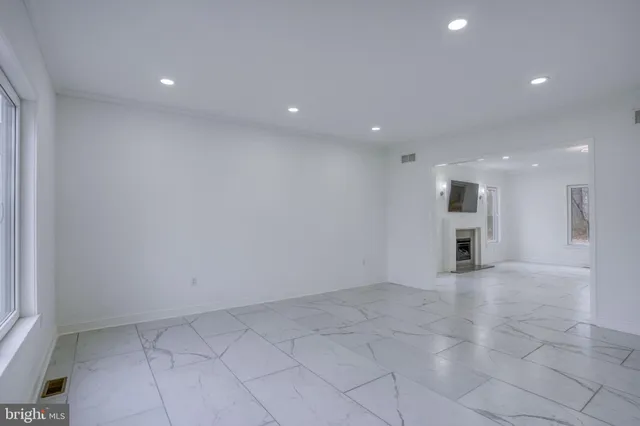 an empty room with windows