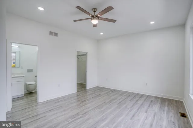 a view of a hallway view with staircase