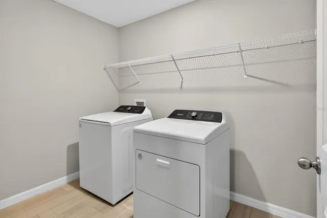 a view of a backyard of the house