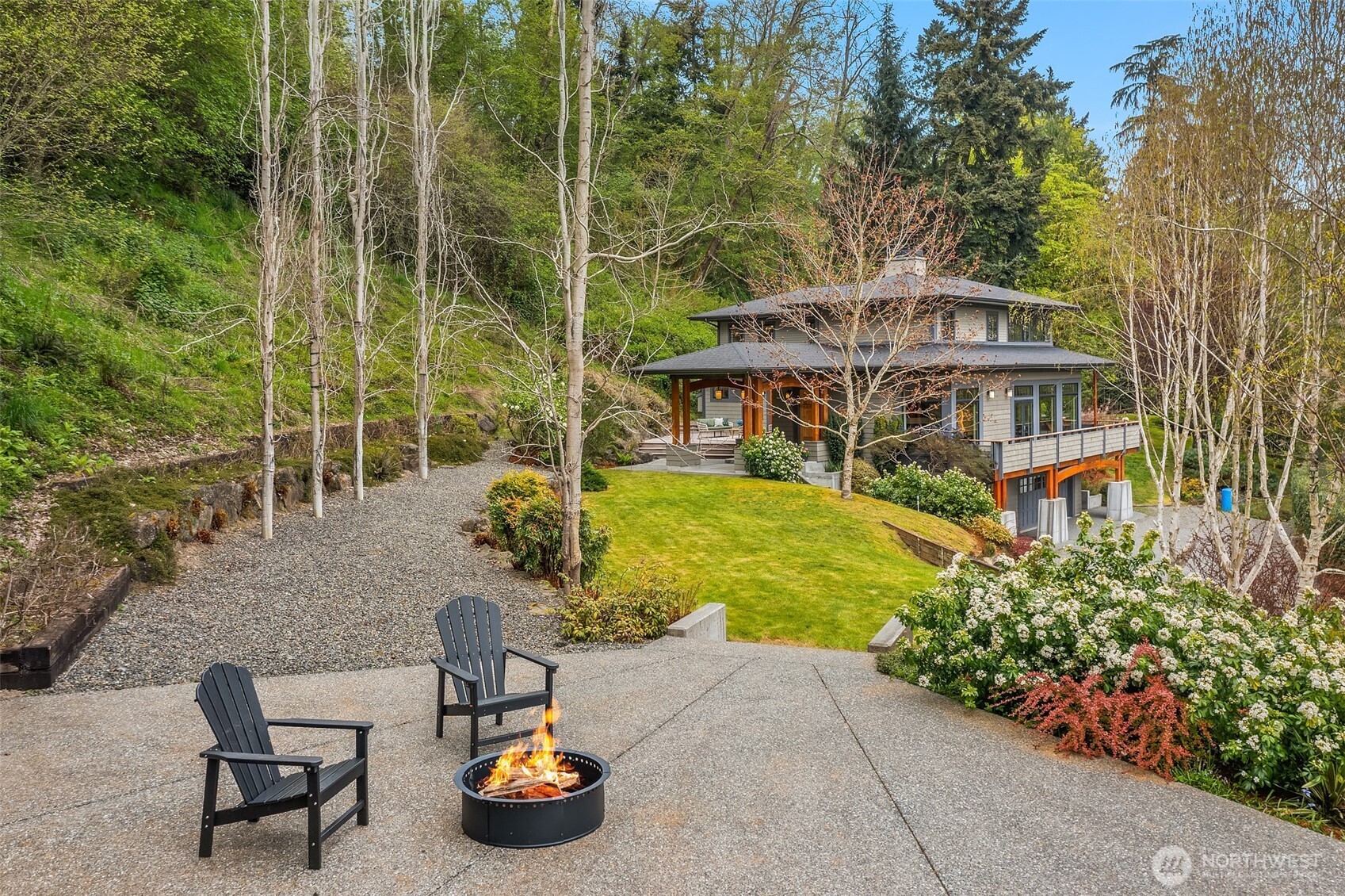 8302 Southwest Dilworth Road Vashon, WA 98070 - Photo 28 of 40 a backyard of a house with lots of green space and fountain