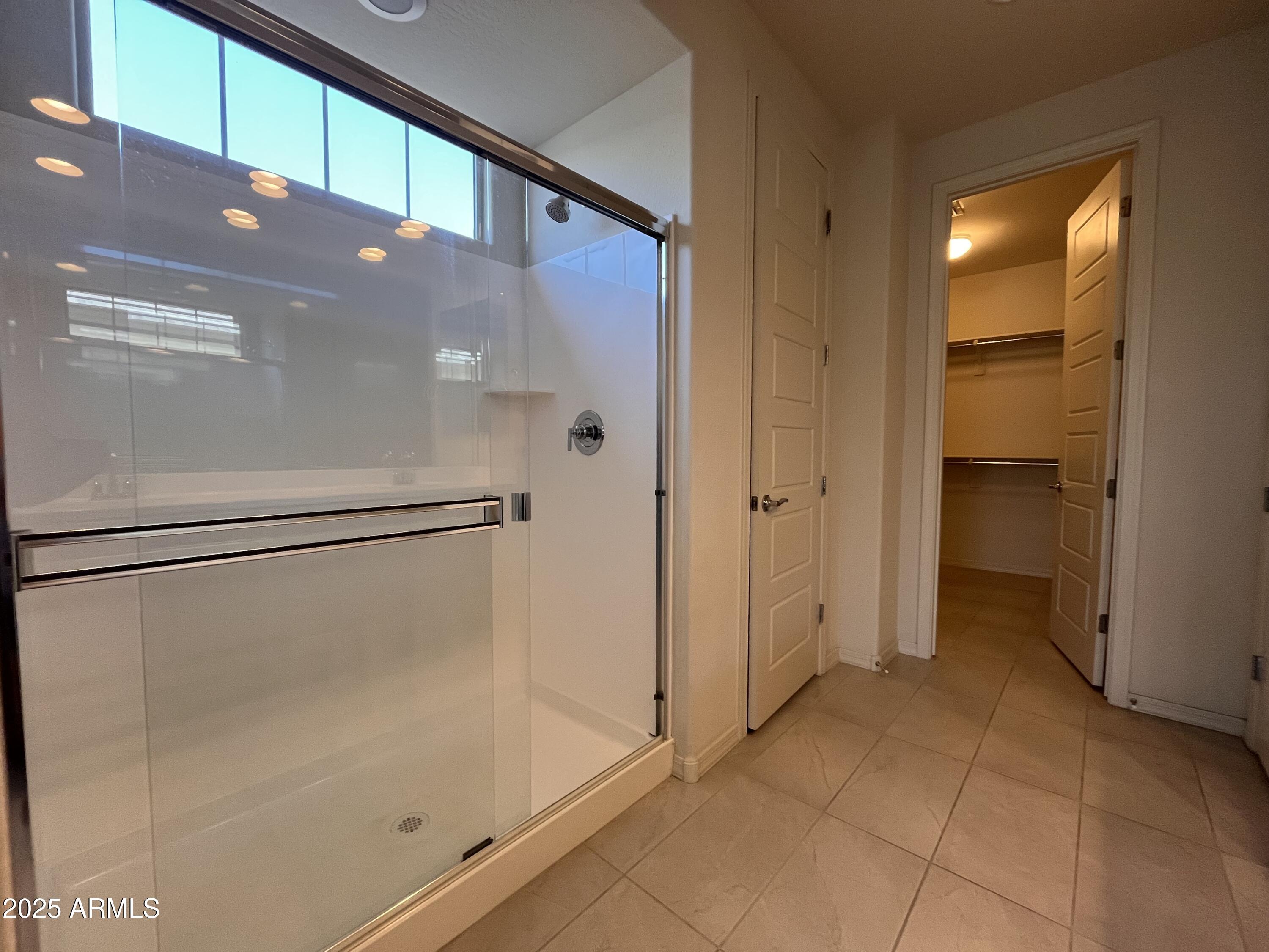 22857 East Marsh Road Queen Creek, AZ 85142 - Photo 26 of 38 a view of a big room with closet and a yard