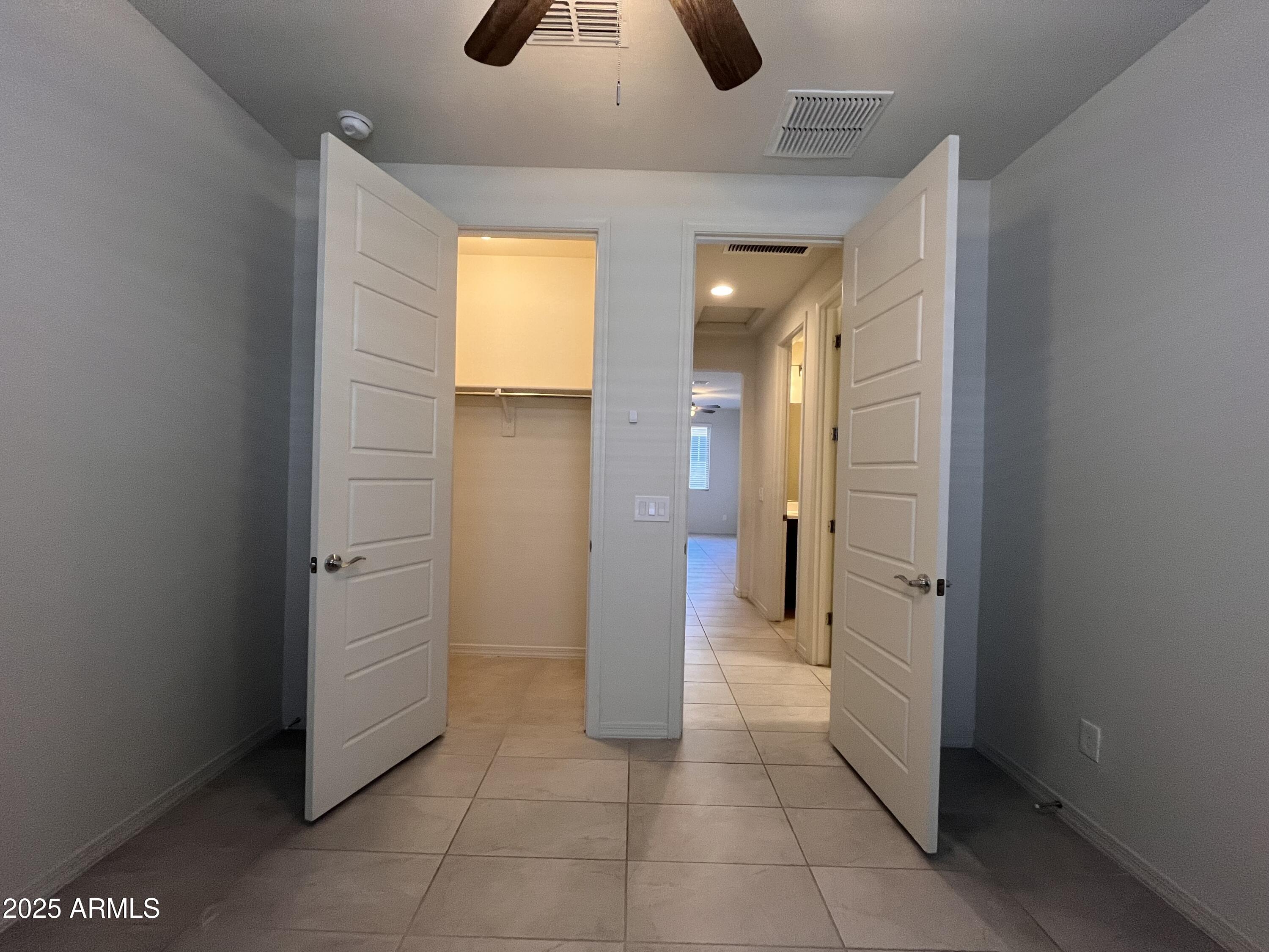 22857 East Marsh Road Queen Creek, AZ 85142 - Photo 31 of 38 a view of a hallway with entryway of a house