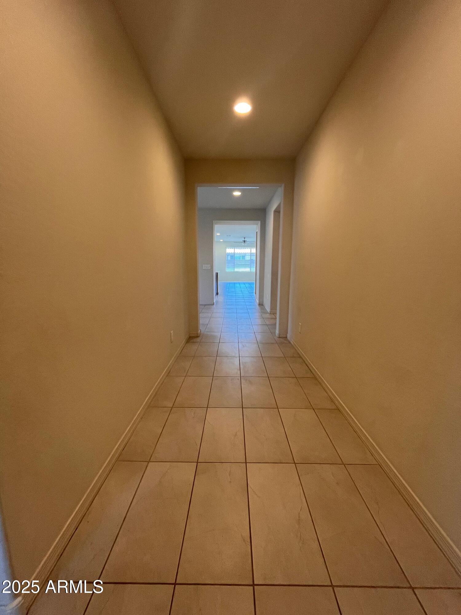 22857 East Marsh Road Queen Creek, AZ 85142 - Photo 4 of 38 a view of a livingroom with an empty space and a window