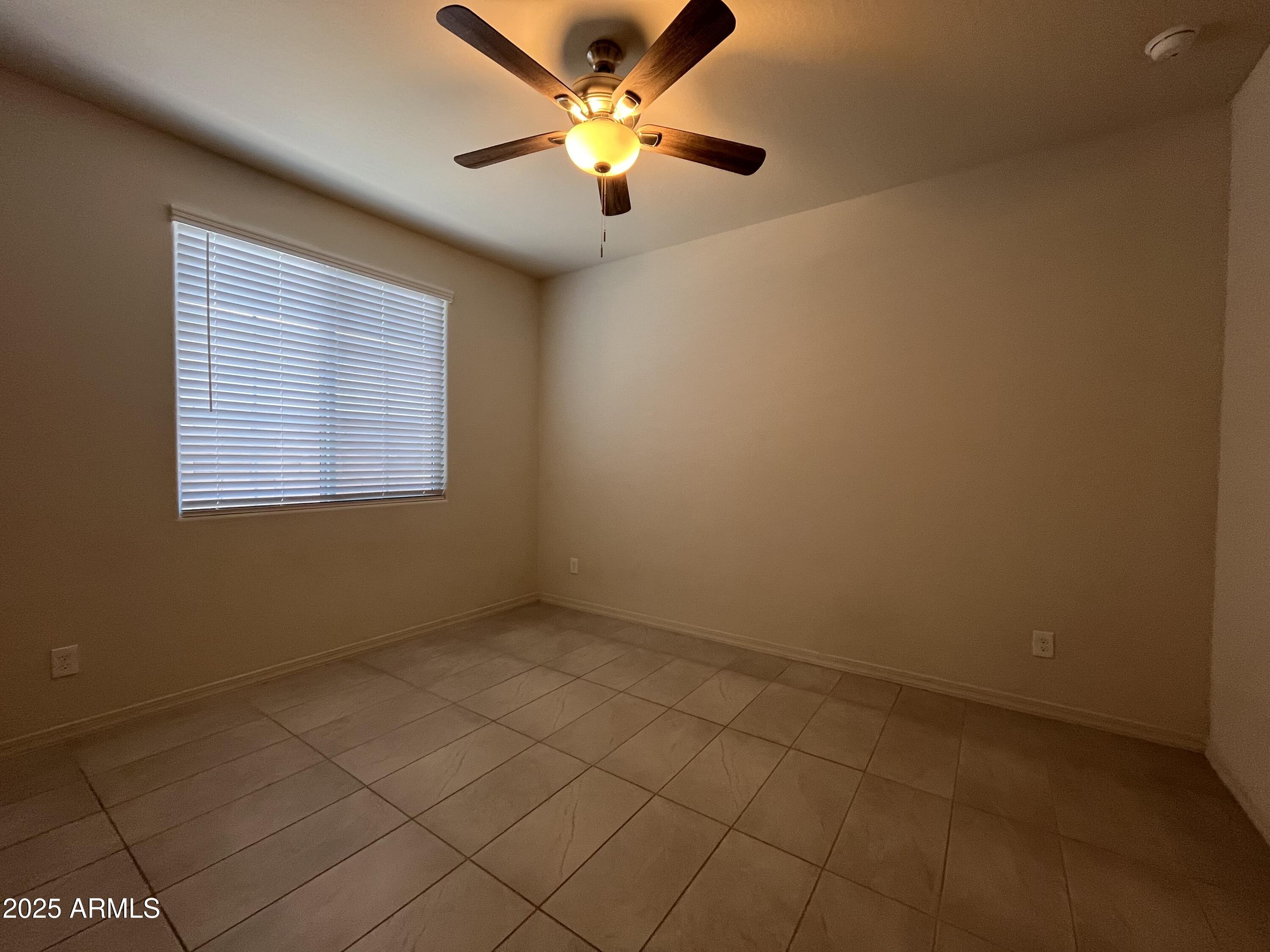 22857 East Marsh Road Queen Creek, AZ 85142 - Photo 5 of 38 a view of an empty room with a window