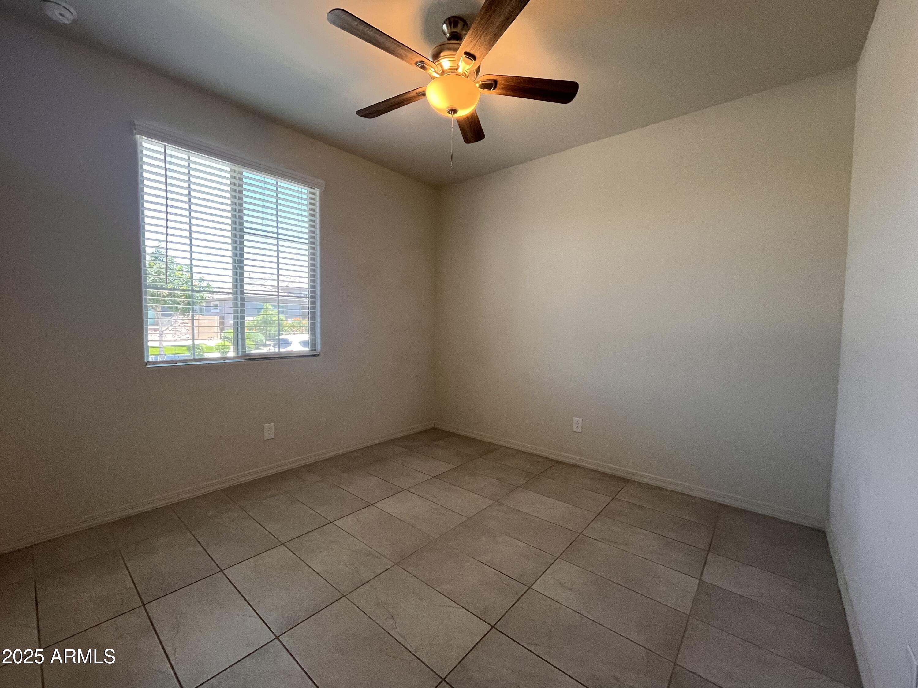 22857 East Marsh Road Queen Creek, AZ 85142 - Photo 8 of 38 a view of an empty room with a window