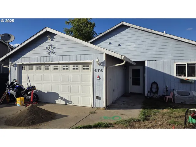 a black and white photo of a house