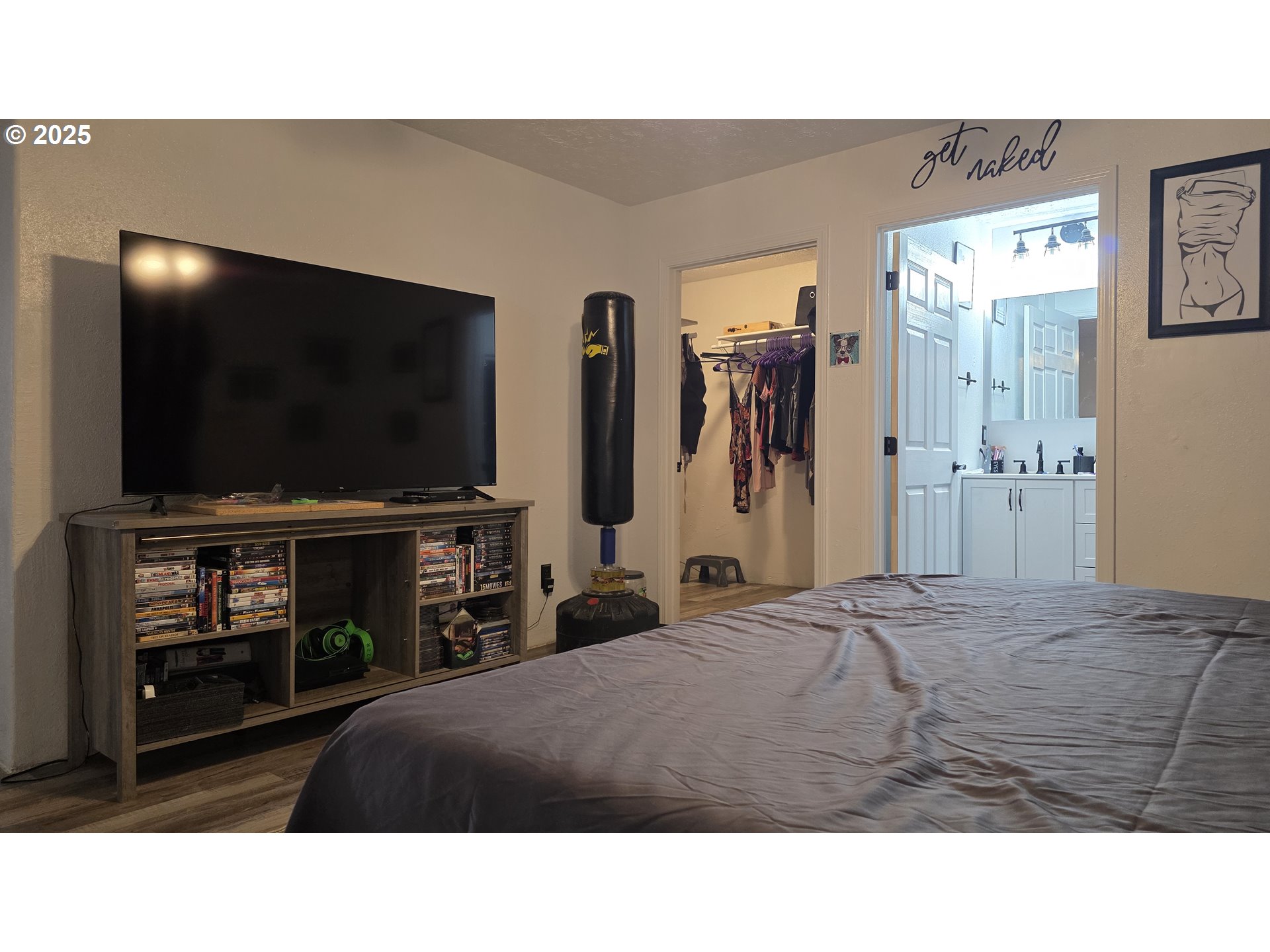 676 58th Street Springfield, OR 97478 - Photo 14 of 30 a living room with furniture and a flat screen tv