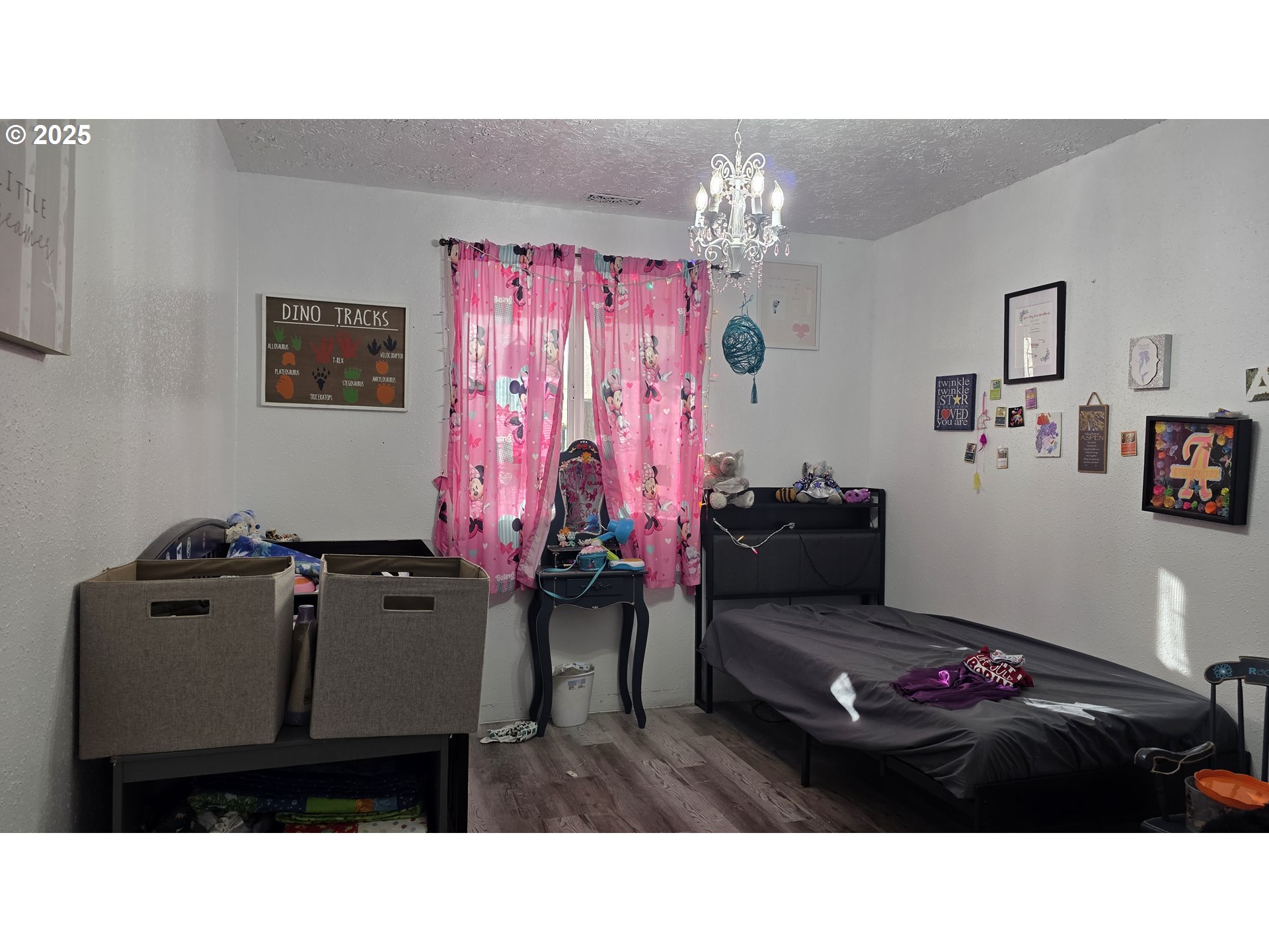 676 58th Street Springfield, OR 97478 - Photo 19 of 30 a living room with furniture and a chandelier