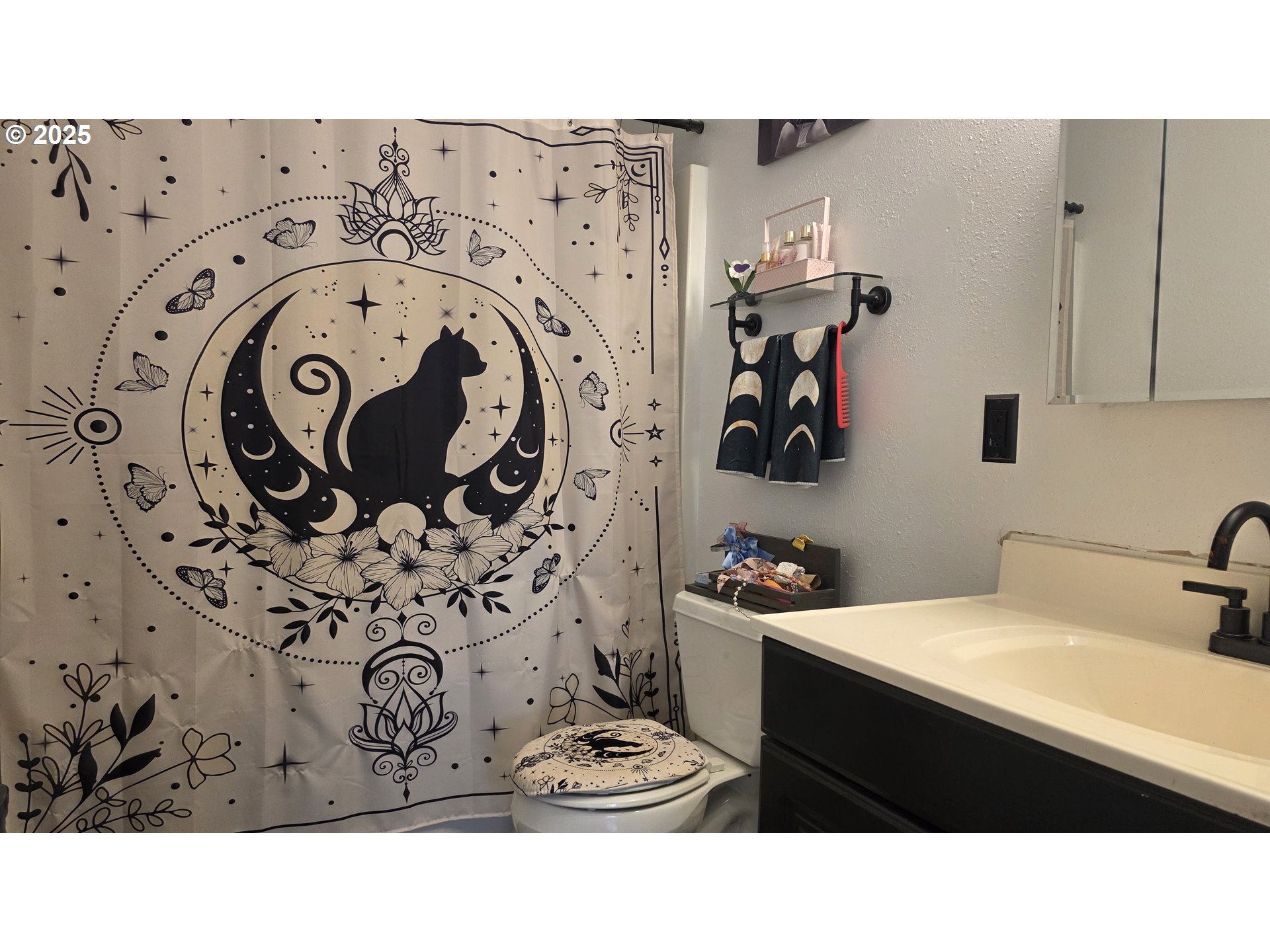 676 58th Street Springfield, OR 97478 - Photo 21 of 30 a bathroom with a sink and mirror