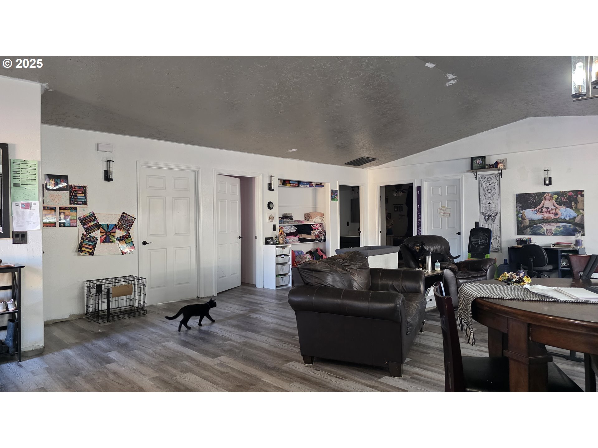 676 58th Street Springfield, OR 97478 - Photo 9 of 30 a living room with furniture and a flat screen tv