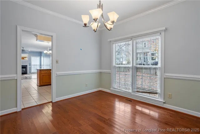 a view of livingroom with wooden floor