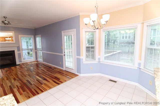 a bathroom with a sink and mirror with toilet