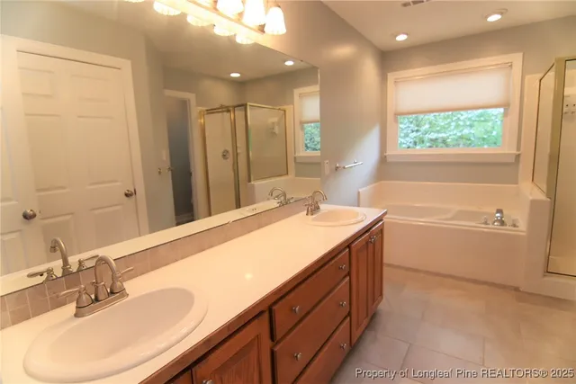 a view of balcony with wooden floor and lake view