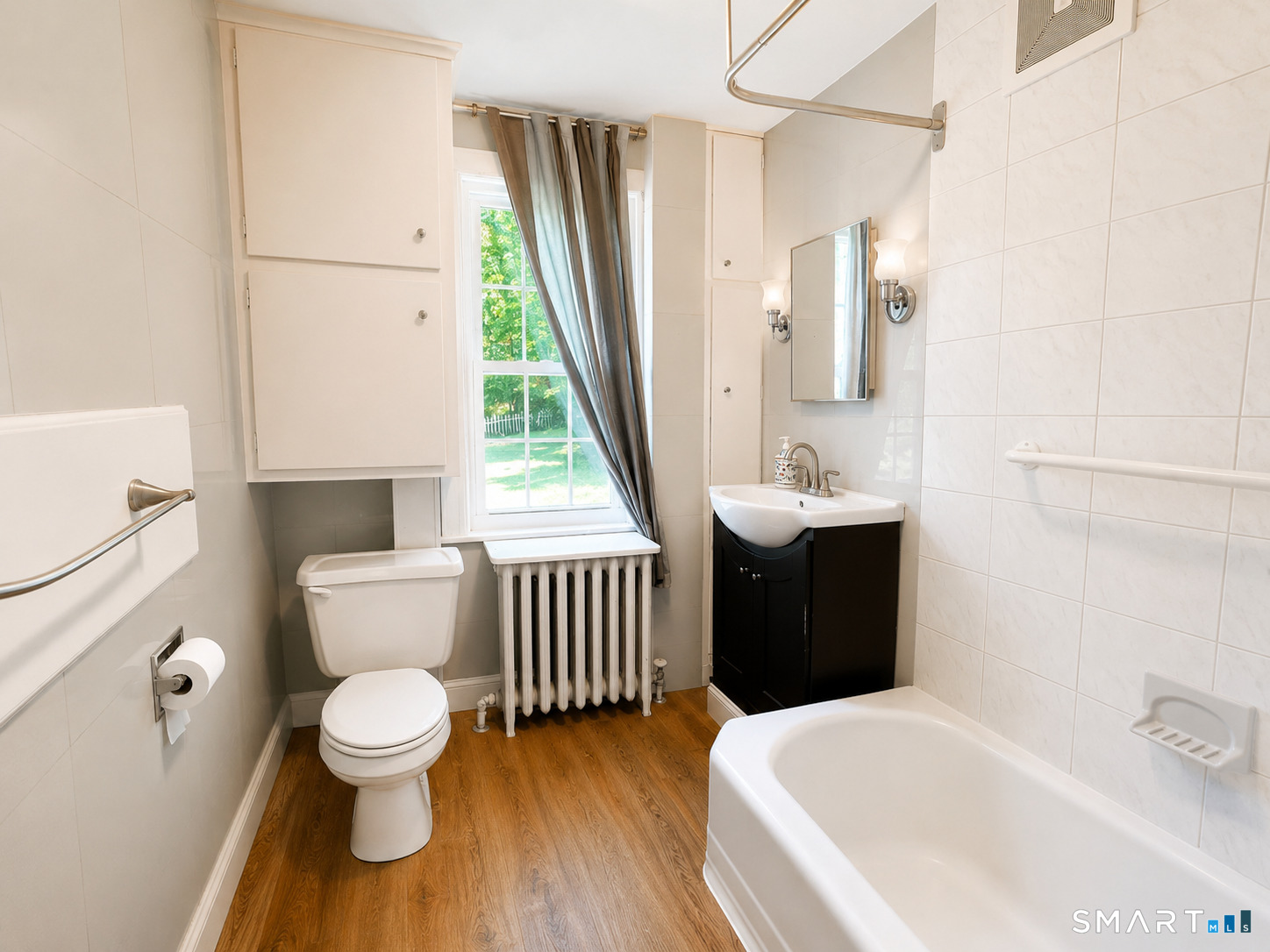 443 Amity Road Bethany, CT 06524 - Photo 15 of 30 a bathroom with a sink and a toilet