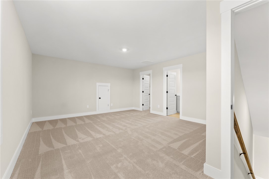 334 Summerall Drive Anderson, SC 29621 - Photo 12 of 28 This spacious area offers carpet flooring and includes a convenient stairwell.