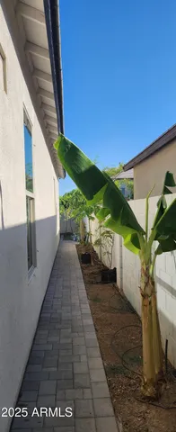a view of a pathway with a balcony
