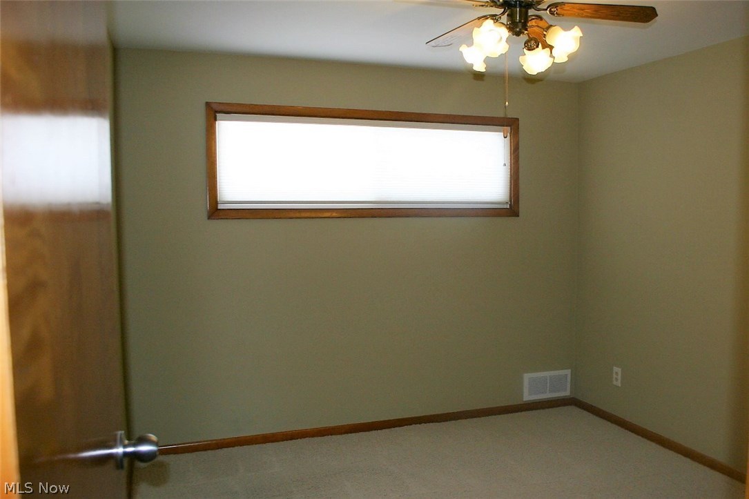 6841 Revere Road Cleveland, OH 44130 - Photo 19 of 31 Third bedroom with newer windows and carpet.