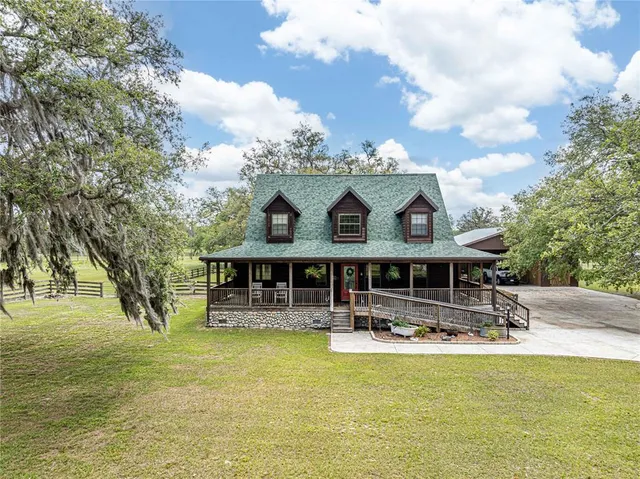 a front view of a house with swimming pool