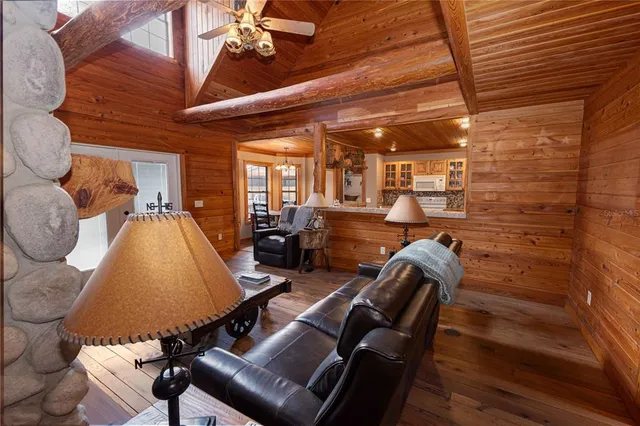 a kitchen with stainless steel appliances granite countertop sink stove and refrigerator