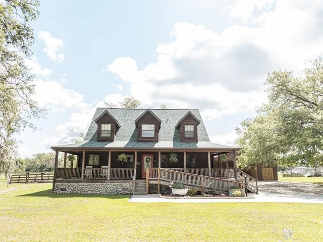 a view of a house with a swimming pool