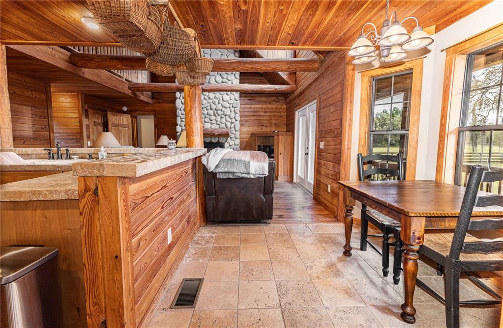 8091 County Road 476B Bushnell, FL 33513 - Photo 21 of 67 a large room with a table and chairs