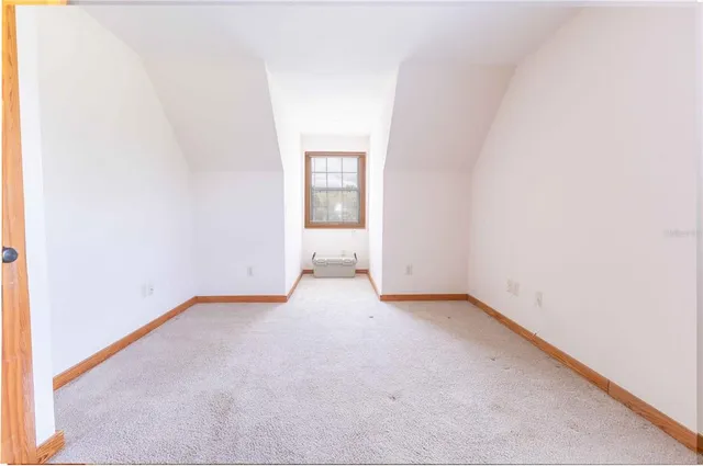 a view of a big room with wooden floor