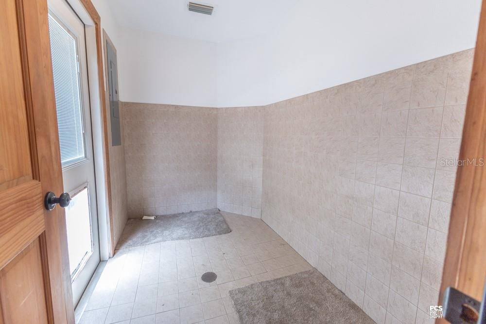 8091 County Road 476B Bushnell, FL 33513 - Photo 42 of 67 a view of a big room with wooden floor