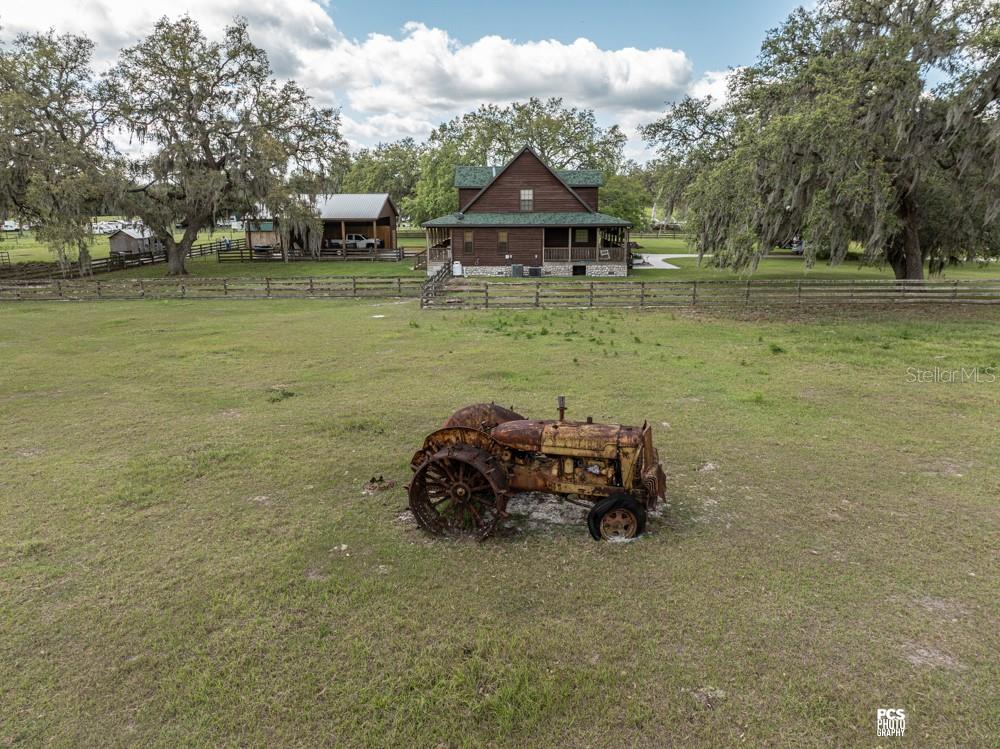 8091 County Road 476B Bushnell, FL 33513 - Photo 60 of 67 a car parked in the middle of a field