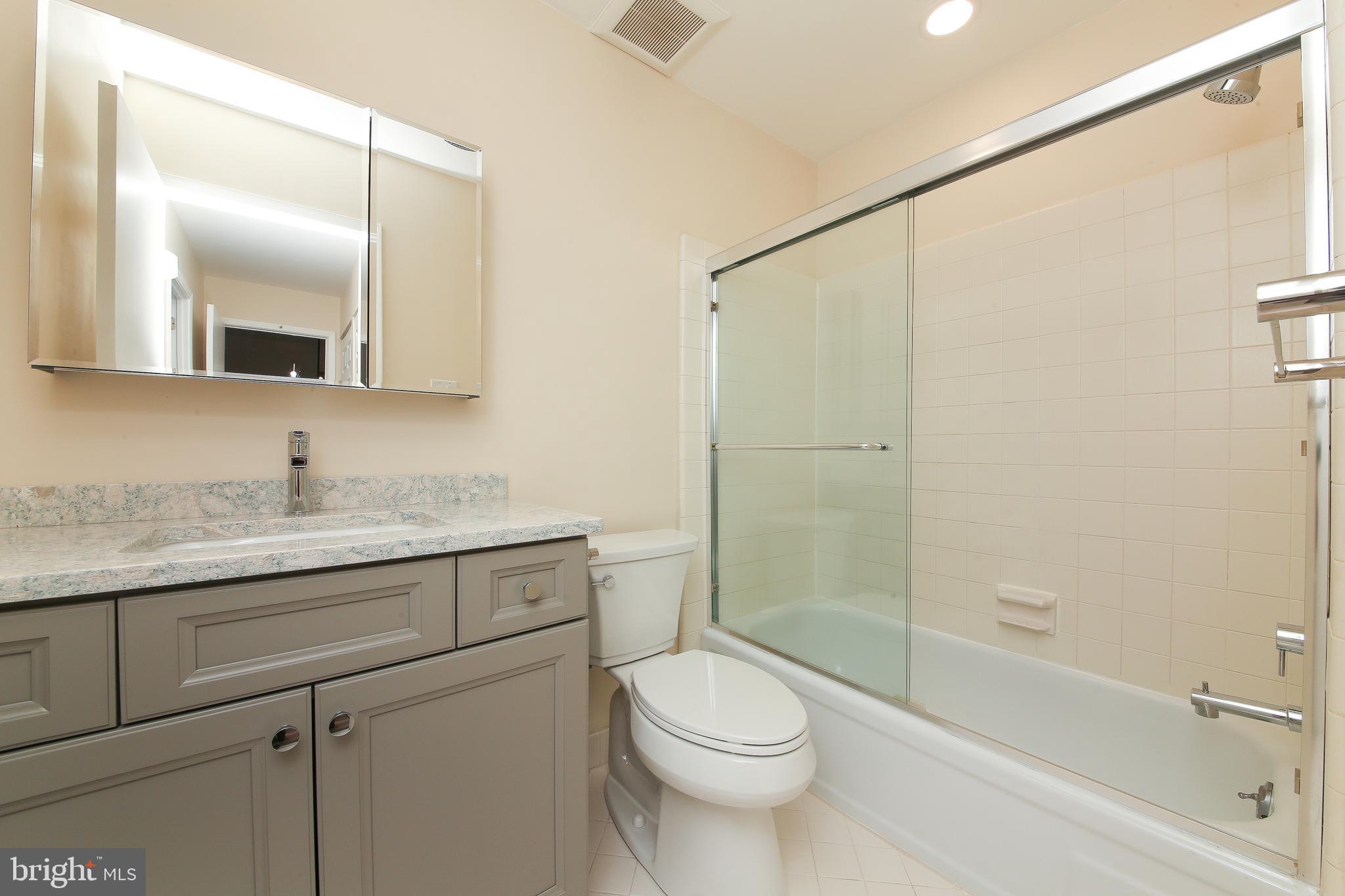 463 Old Forge Crossing, Unit 463 Devon, PA 19333 - Photo 13 of 35 Bath has new vanity & quartz counters