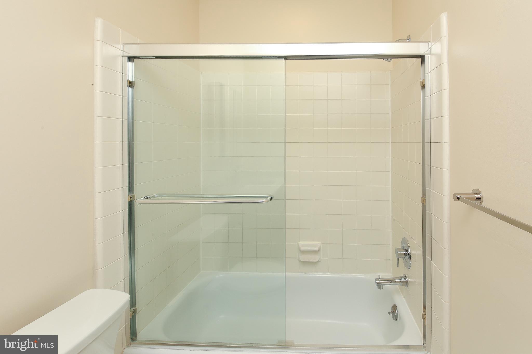 463 Old Forge Crossing, Unit 463 Devon, PA 19333 - Photo 14 of 35 Glass enclosed tub & shower