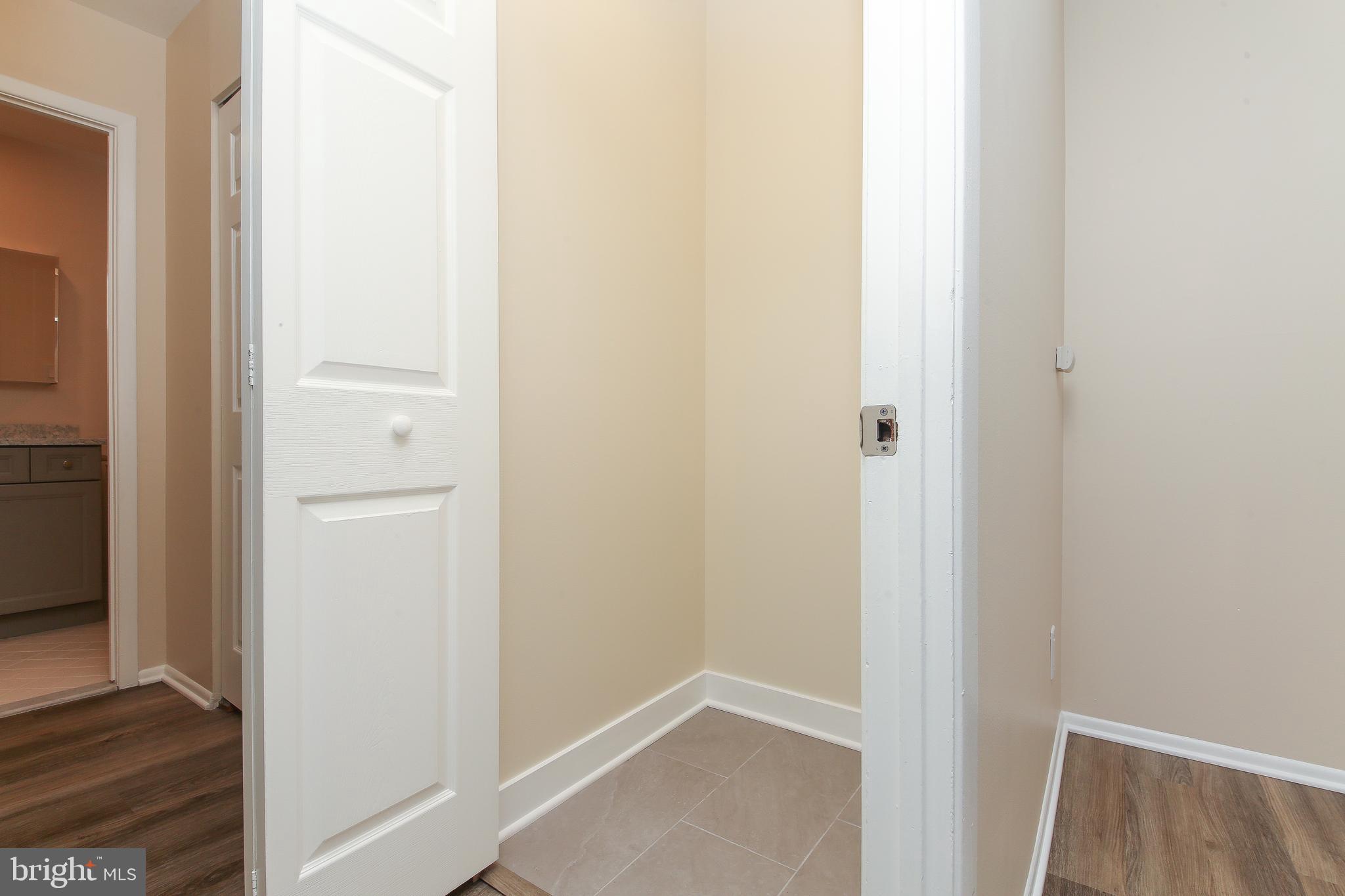 463 Old Forge Crossing, Unit 463 Devon, PA 19333 - Photo 17 of 35 Extra storage closet has new tile flooring